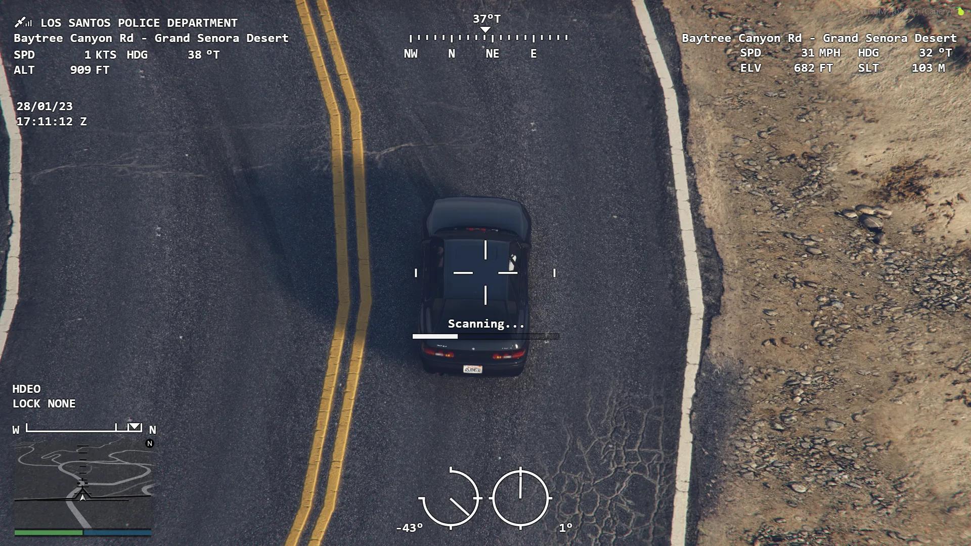FiveM helicopter camera tracking a vehicle from above using the aerial surveillance system.
