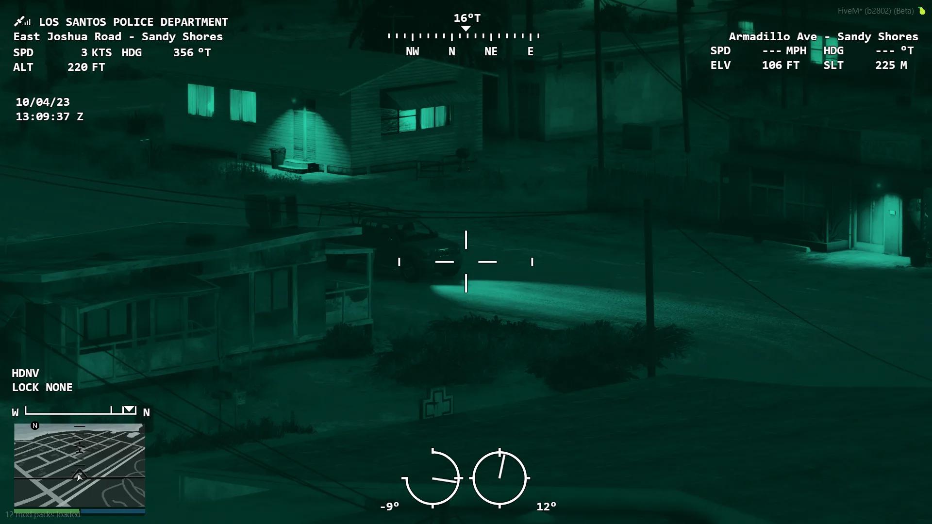 FiveM helicopter camera green night vision mode monitoring buildings and streets in low light.
