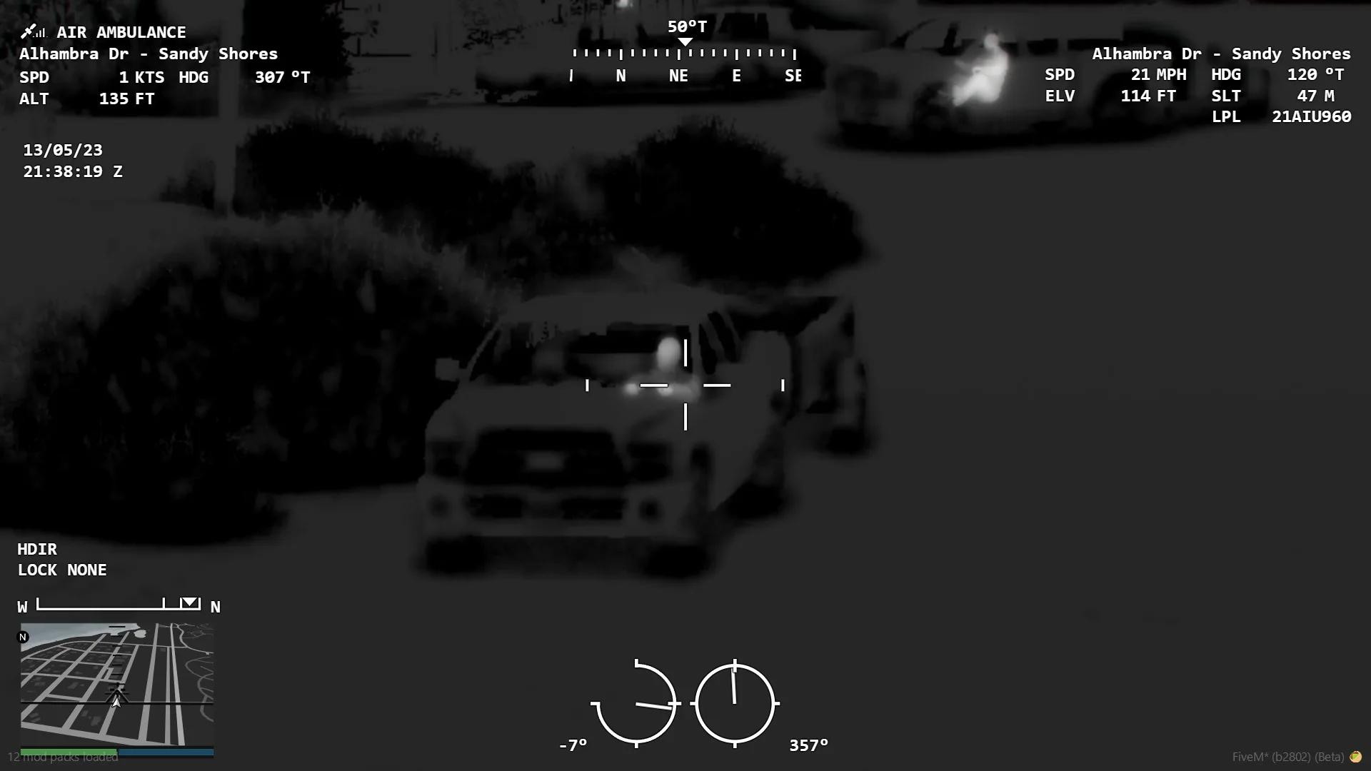 FiveM helicopter thermal camera view showing vehicles and buildings during nighttime surveillance.
