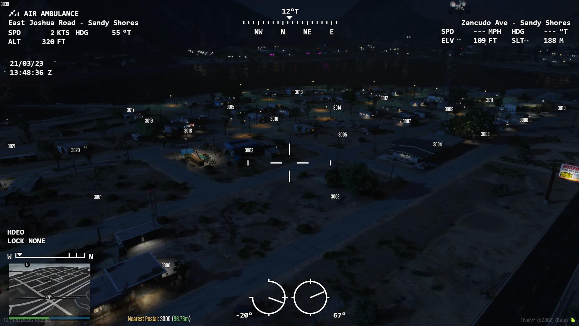 FiveM helicopter camera overlooking city streets at night during aerial police patrol.